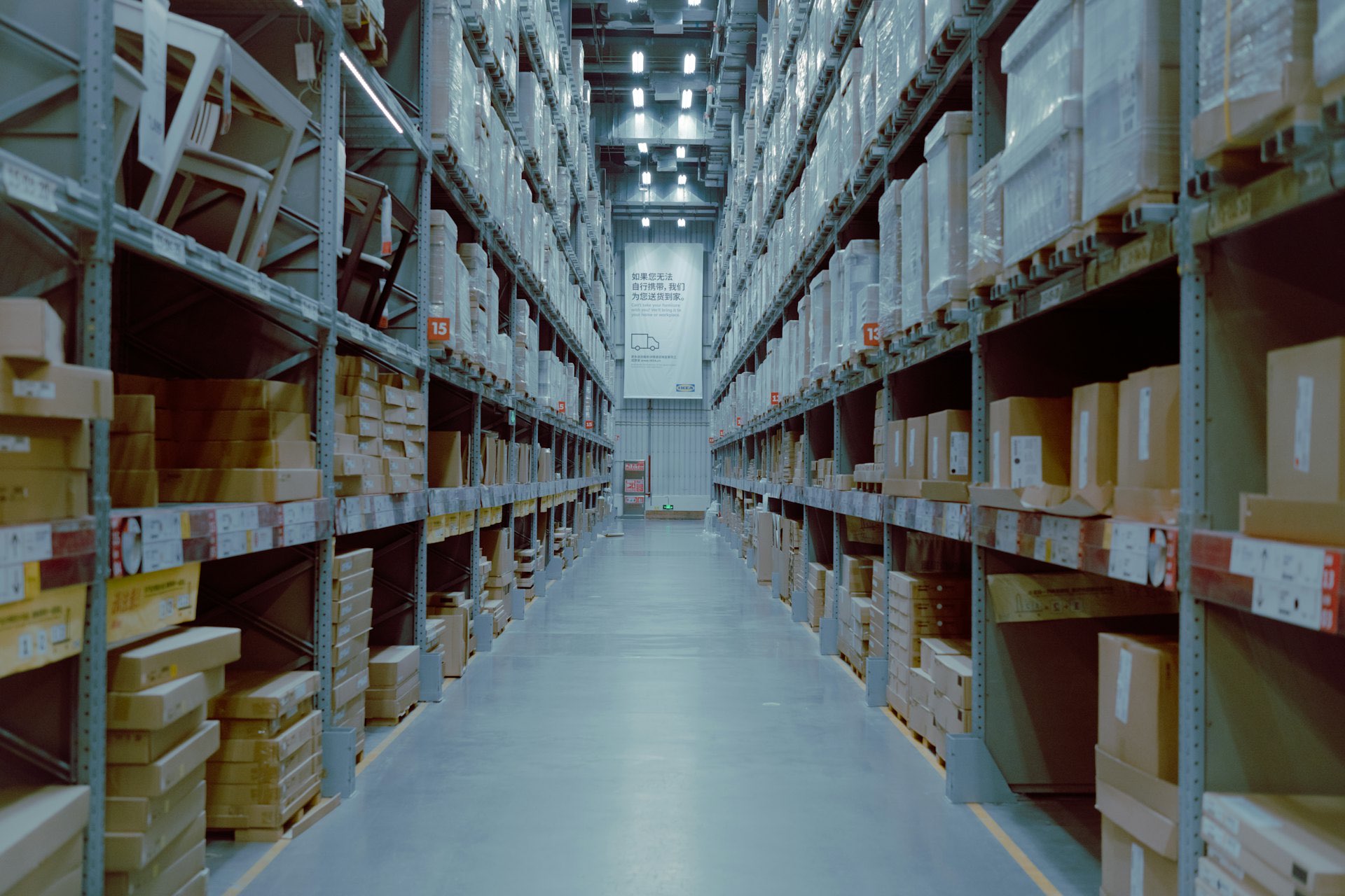 Warehouse aisle with high shelving